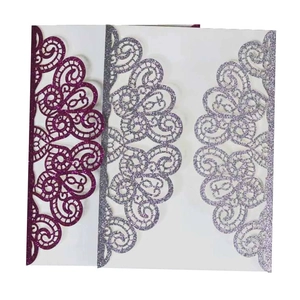 Glitter laser-cut invitation covers featuring intricate floral hollow designs in multi-colors