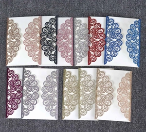 Detailed laser-cut hollow lace patterns on glitter paper wedding invitation covers