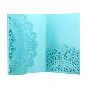 Laser cut light blue wedding invitation sleeve with pearlescent floral lace pattern