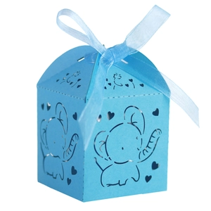 Detail of blue laser-cut paper gift box featuring cartoon elephant and ribbon bow