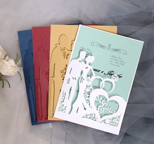 Laser cut wedding invitations with bride and groom silhouettes in various pearlescent colors