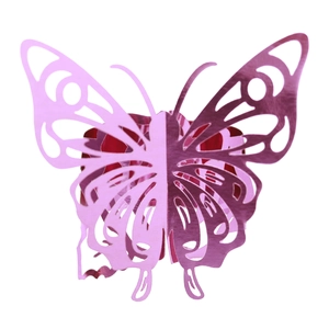 Close-up of pink laser-cut double-layer hollow butterfly napkin ring with metallic finish