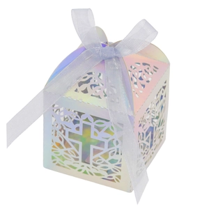 Detailed laser-cut hollow gift box with iridescent rainbow finish and purple ribbon bow