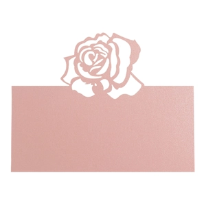 Detail of laser-cut rose hollow place card in shimmering pearlescent pink paper