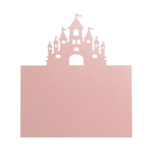 Macro detail of laser-cut pink castle place card with pearlescent glitter paper texture