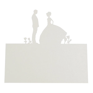 Detail of laser-cut white wedding place card with silhouette and rose pattern