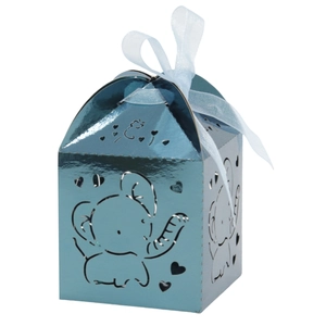 Detail of light blue metallic candy box with hollow elephant patterns and white ribbon bow