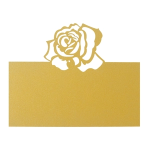 Detail of laser-cut gold rose pattern on pearlescent card for wedding table seating