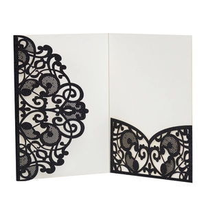 Elegant black laser-cut invitation holder with glitter finish and mandala patterns