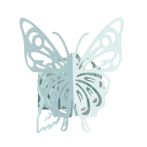 Detail of light blue laser-cut butterfly napkin ring with pearlescent shimmer texture