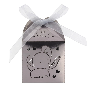 Detail of silver hollow elephant candy box with blue organza ribbon for parties