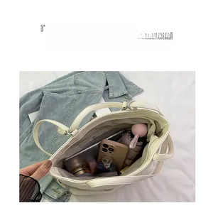 Top view of cream white tote bag interior showing large capacity and multi-compartment storage