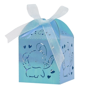 Detail view of laser-cut elephant candy box with iridescent blue finish and white ribbon