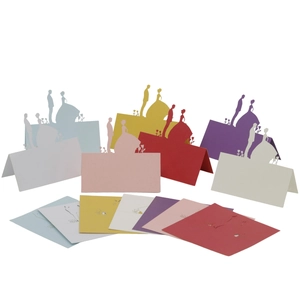 Laser cut wedding place cards featuring bride and groom silhouettes in multiple colors