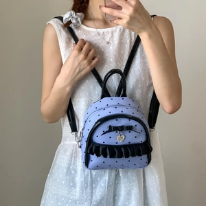 Mini sac à dos en velours côtelé lilas à pois avec nœud et détails à volants