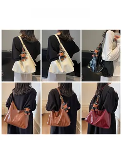 Collage of chic large tote bags in cream, black, tan, and burgundy with cute bear charms