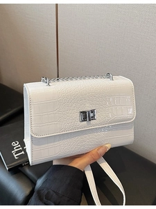 White crocodile pattern square shoulder bag with silver chain and twist lock buckle