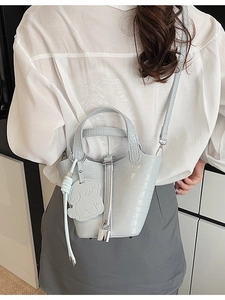 Classic light blue crocodile texture mini bucket bag with small dog charm and metal lock