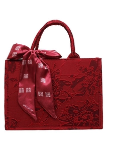 Elegant red jacquard wedding tote bag with floral texture and double happiness ribbon