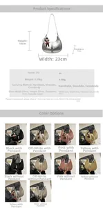 Detailed view of the vintage solid color dumpling bag with a cute monkey keychain