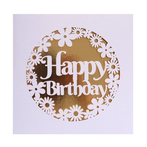 Detail of laser-cut Happy Birthday card with gold foil backing and daisy flower pattern