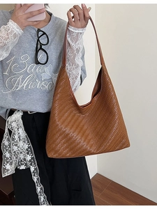 Brown woven tote bag for women showing spacious retro shoulder hobo bag style