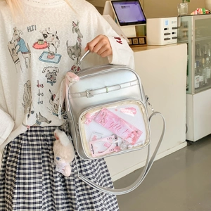 Sac à dos ita argenté avec fenêtre en PVC transparent et charm lapin en peluche