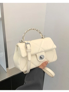 Chic quilted beige chain shoulder bag with metal lock and adjustable strap for women