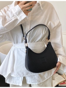 Classic black crescent shoulder bag in lychee pattern leather for women with CELE BAG logo