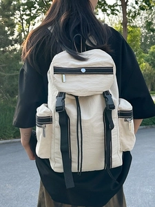 Minimalist beige travel backpack for men and women with adjustable straps for outdoor hiking