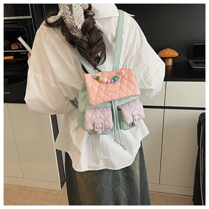 Mini pastel quilted backpack with colorful beads shown in a stylish home setting