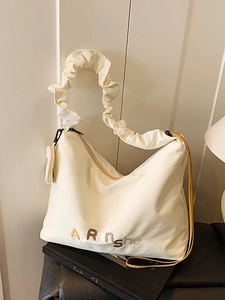Sac cabas blanc plissé avec bandoulière jaune et petite pochette pour un usage quotidien