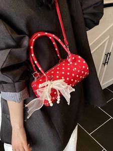 Sac à main cylindrique rouge à pois avec breloque perle et bandoulière pour femme