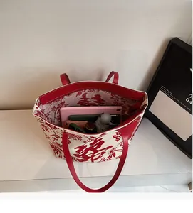 Macro view of large tote bag interior showing spacious capacity for daily essentials