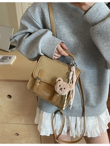 Sac à dos rétro marron étanche pour femme avec motif de lettres et breloque petit ours