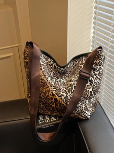 Chic leopard print large tote bag with adjustable wide strap for casual commuting