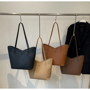 Multiple views of large capacity tote bags in four colors with textured pebble leather