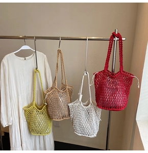 Detail showing colorful knit crochet tote bags with drawstring liners and mesh weave texture