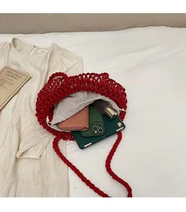 Interior view of red crochet tote bag with drawstring liner showing large storage capacity