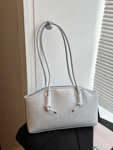 Minimalist light blue patent leather tote bag with stylish knot details for women