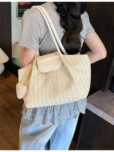 Large capacity beige woven straw tote bag with heart charm for summer beach vacation