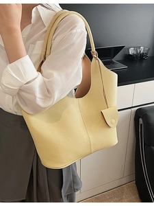Minimalist light yellow lychee pattern leather hobo bag for women in office scene