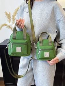 Waterproof green nylon crossbody bag set with top handle and adjustable strap for women