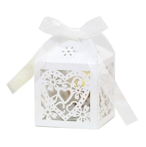 White laser cut heart pattern paper favor box with ribbon for wedding and party gifts