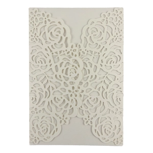 Laser-cut white rose floral wedding invitation cover with intricate pearlescent paper detail