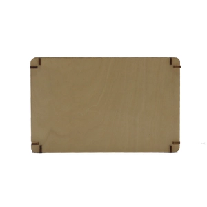 Detail of laser-cut wooden frame parts showing joinery slots and natural wood grain texture