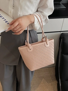 Pink woven tote bag with V-shaped texture and silver ring details for women