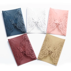 Detailed laser-cut butterfly wedding invitations shown in five elegant pearlescent colors