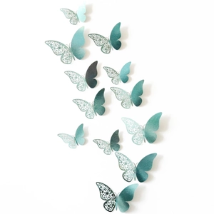 Macro view of blue 3D hollow butterfly wall stickers with metallic double-layered wings