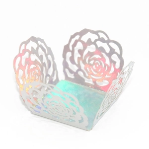 Detailed laser-cut rose pattern cupcake wrappers in iridescent mirror finish